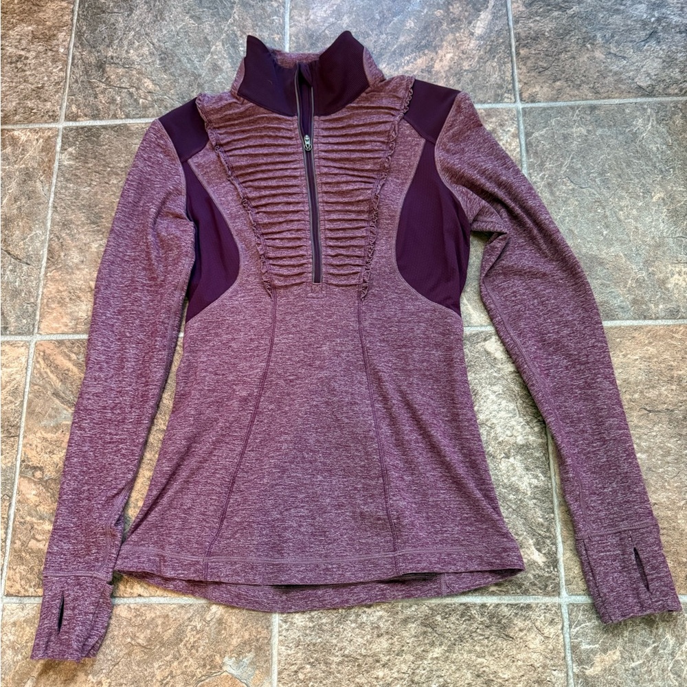 Lululemon Athletics 1/2 zip ruffled running top.